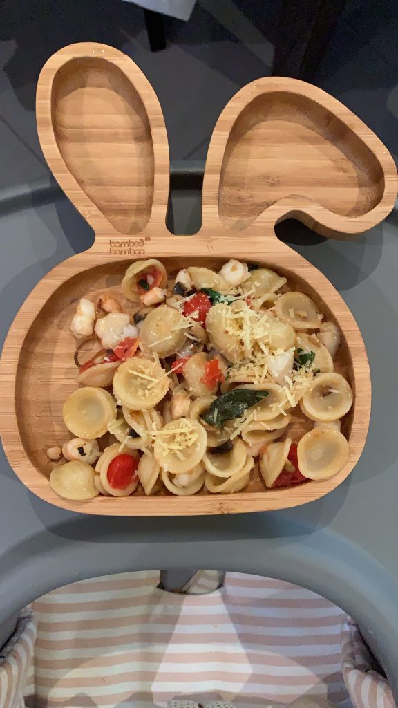 Prawn and scallop pasta in a wooden rabbit plate for babies